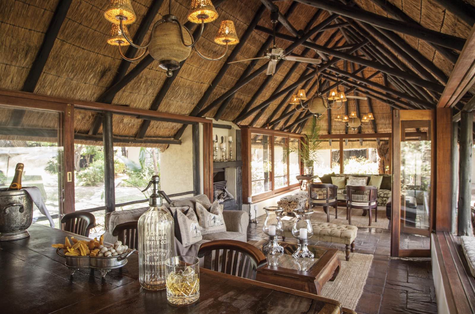 Bar and lounge under thatch at the luxurious Kings Camp
