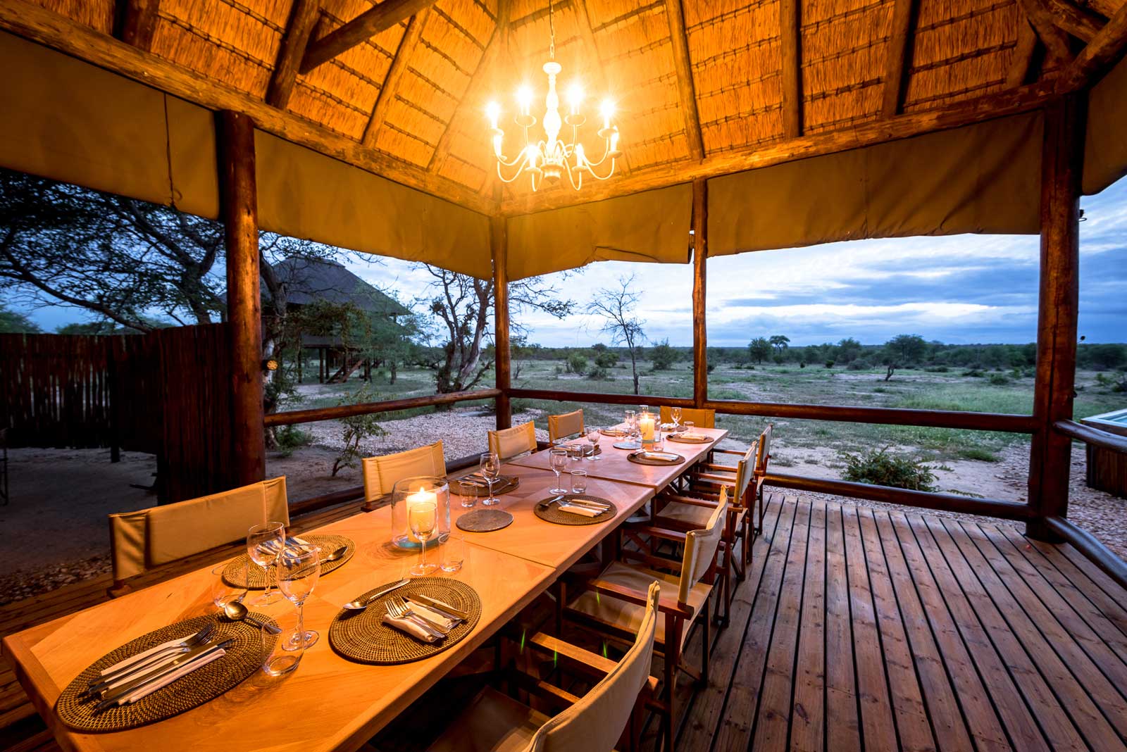 The dining area at nThambo Tree Camp, opened up to look onto the surrounding bush