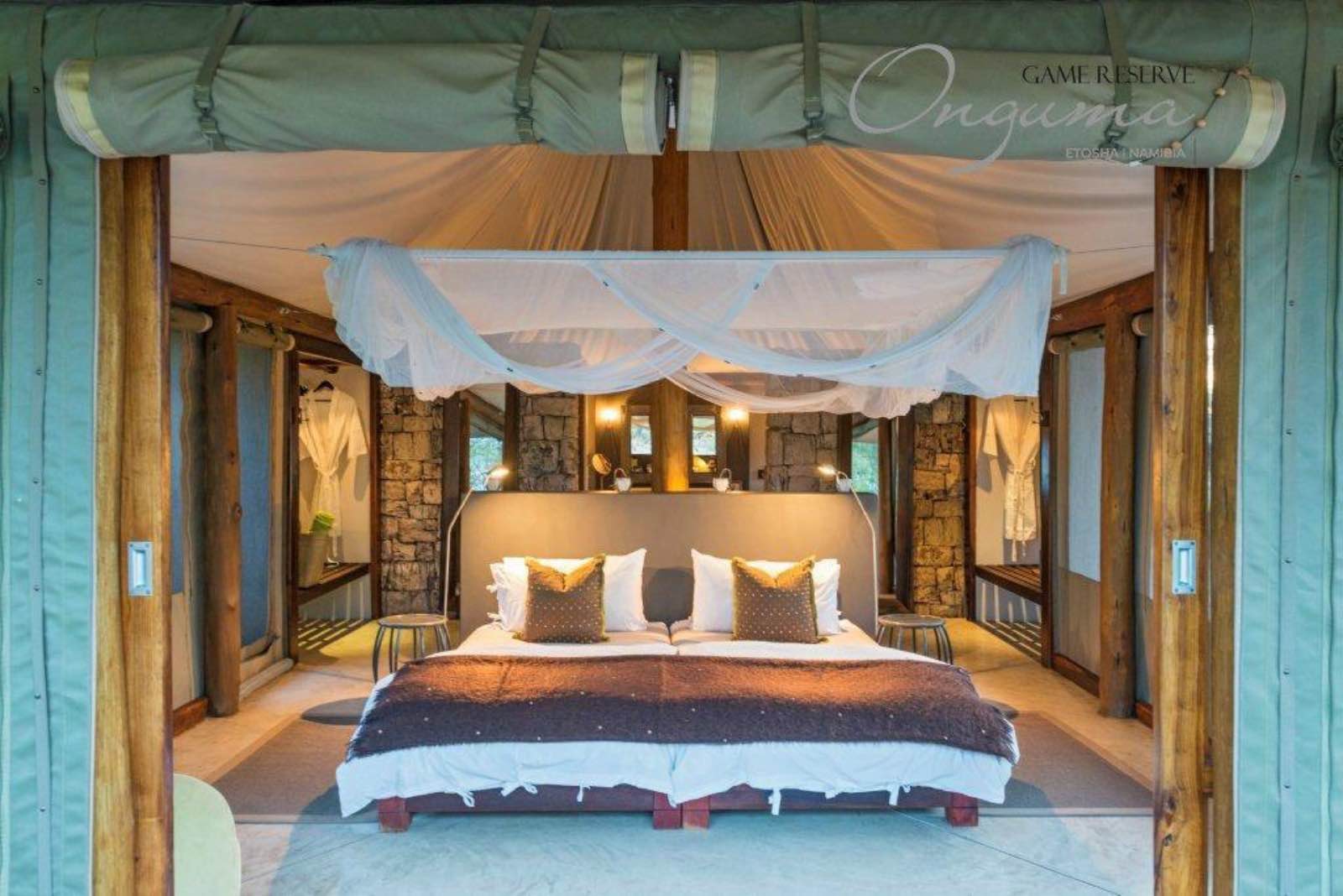 Onguma Tented Camp bedroom with canvas sides and ceiling
