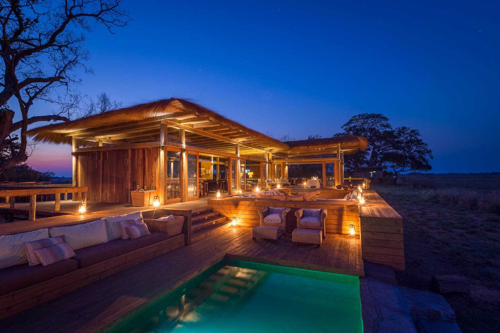 Gently glowing in the evening light, the luxury suites at Shumba Camp are a work of art