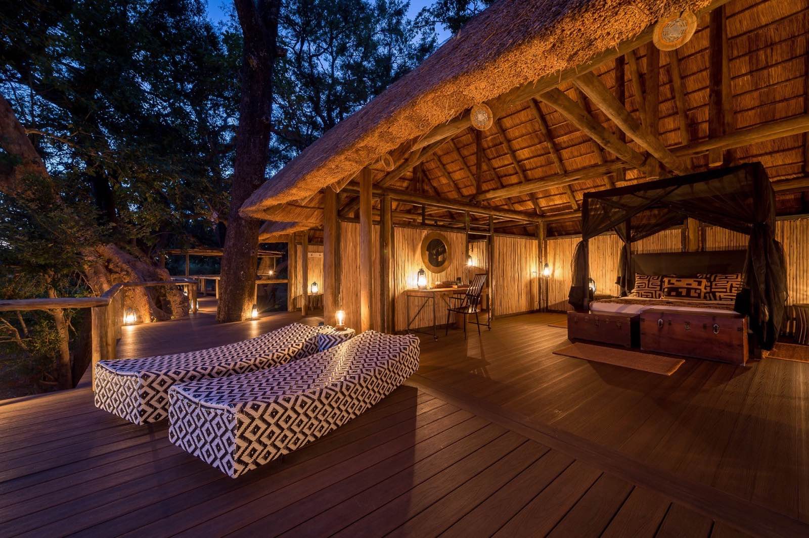 Romantically lit, open air bedroom at Chamilandu