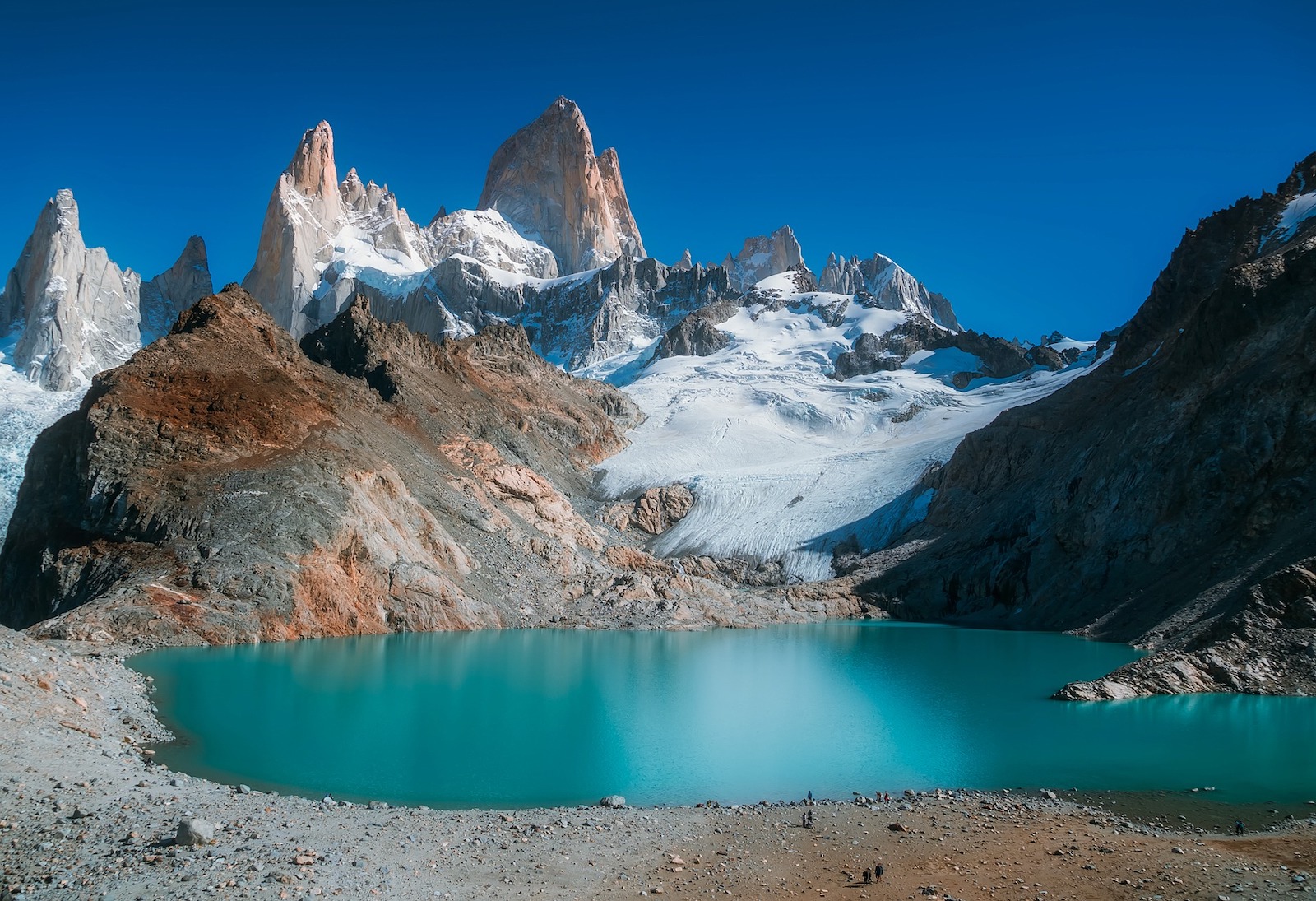 Hiking to the base of Mount Fitz Roy where a shimmering blue lake pans out beneath the granitic spears