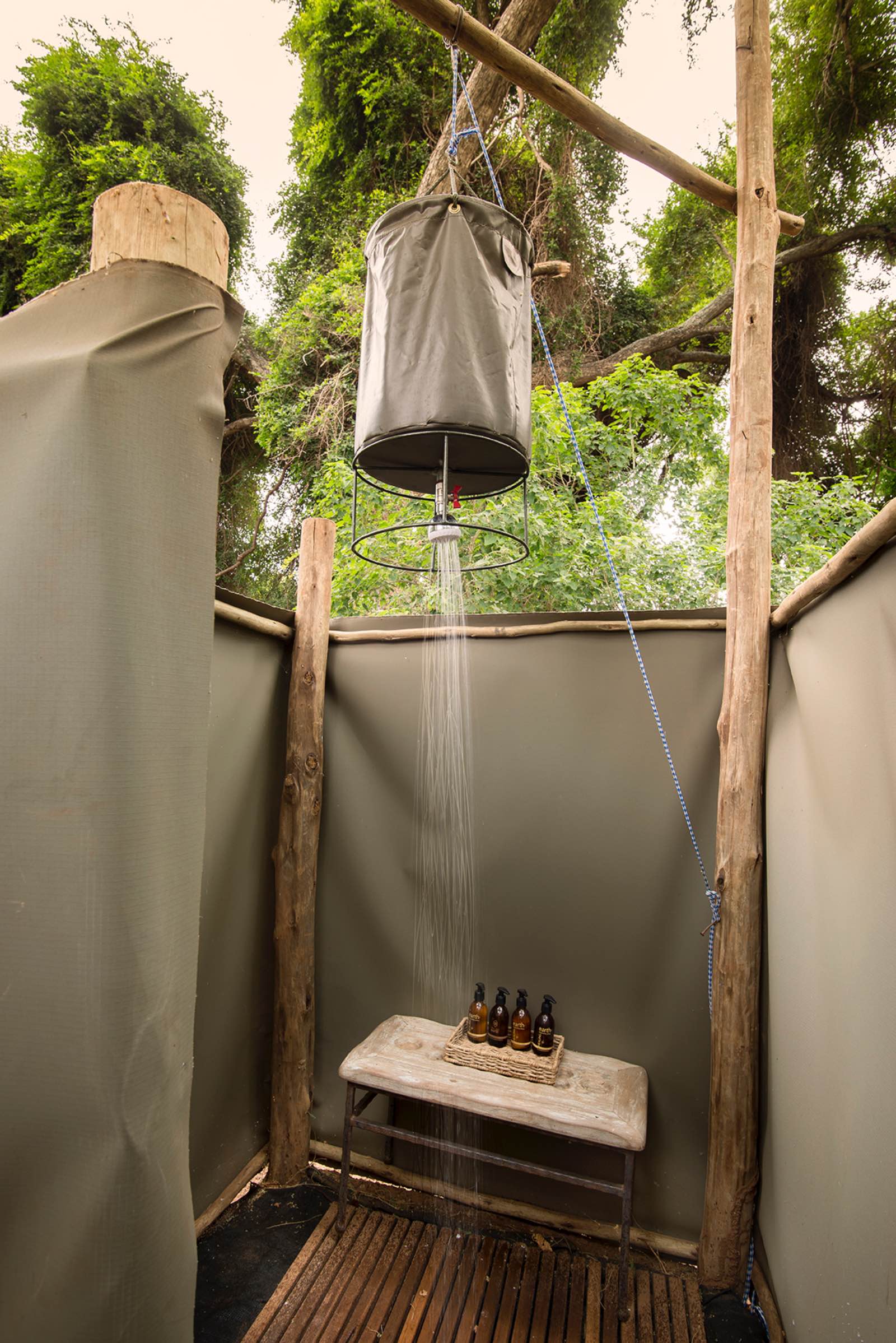 Private bucket shower attached to each tent at Pafuri Trails Camp