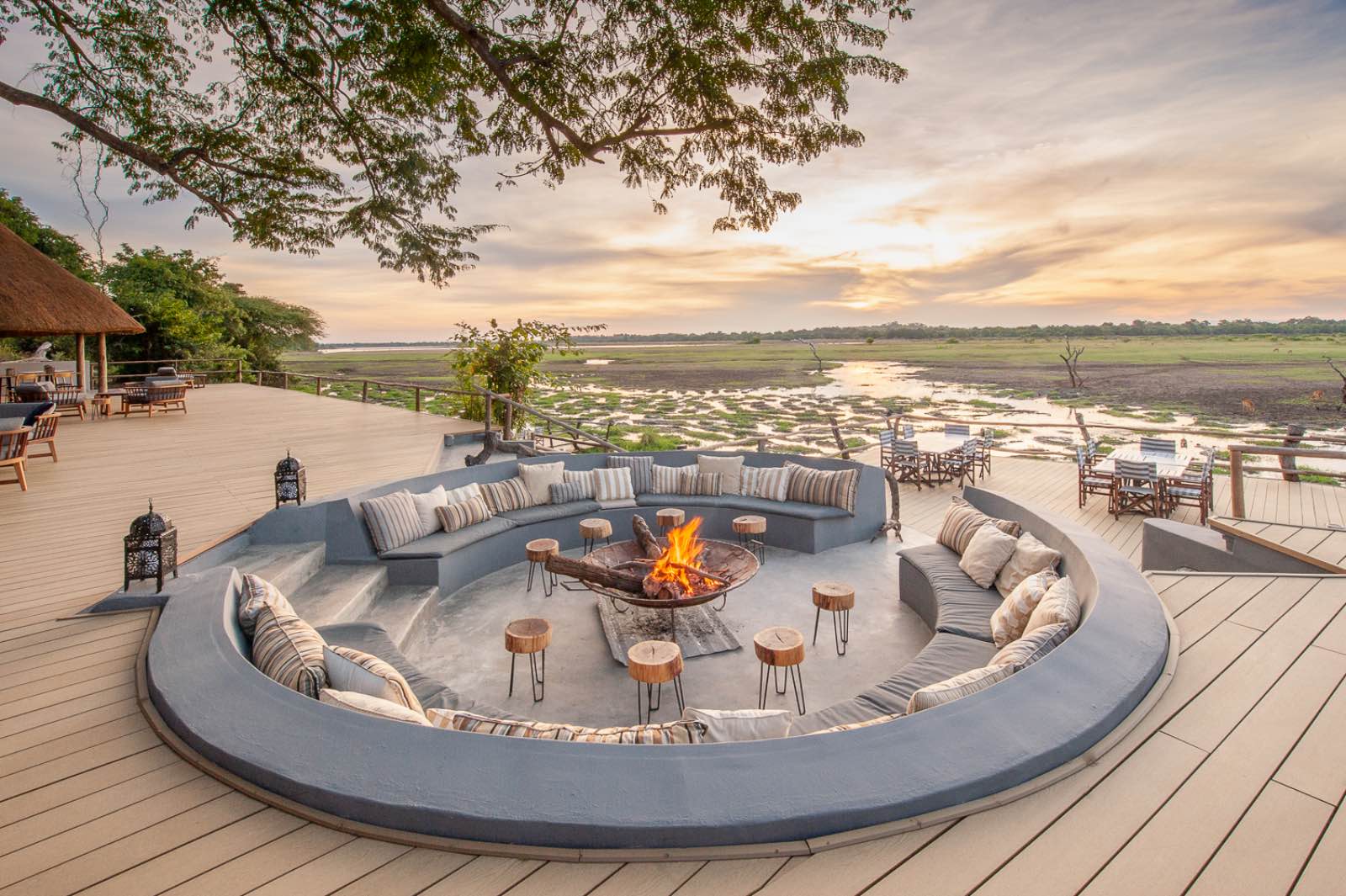 The sunken circular lounge surrounding the fire pit