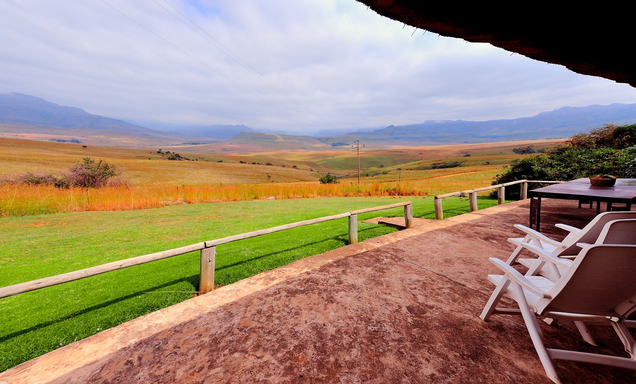 Relax on the verandah of your self-catering cottage at Berghouse in the Drakensberg