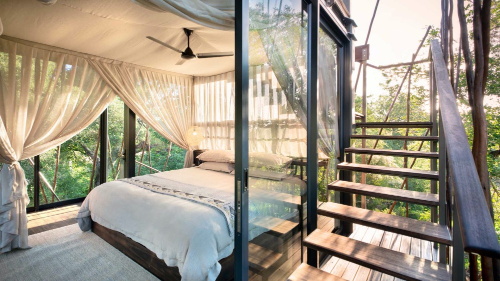 The weather proof indoor bedroom of the Ngala Treehouse